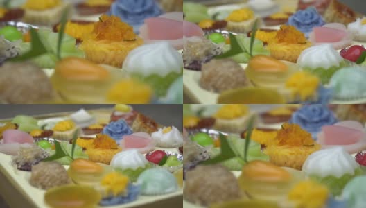 极端近距离观看五颜六色的泰国甜点在小杯子。高清在线视频素材下载