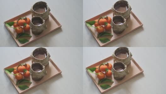 中国新年传统食品年糕与桔子高清在线视频素材下载