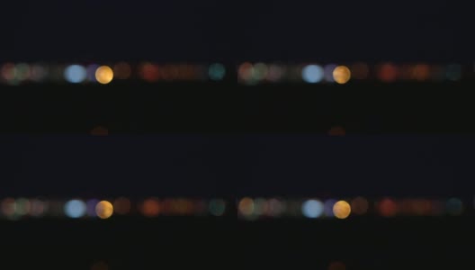 说明海市蜃楼城市在黑暗中散景效果城市灯光高清在线视频素材下载