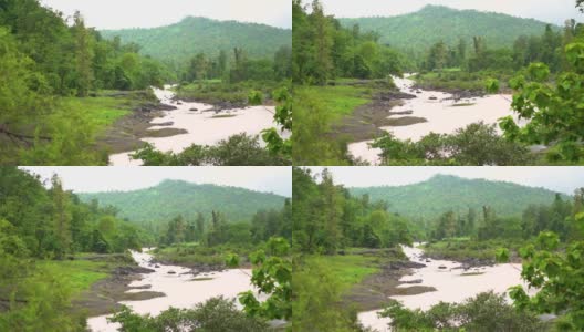 在印度古吉拉特邦萨普塔拉附近的Waghai瀑布附近，从山上可以看到季风期间流淌在山前的Ambika河高清在线视频素材下载