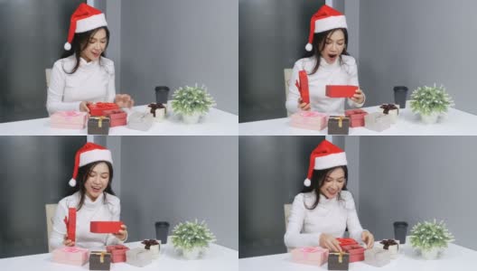 圣诞老人里惊讶的女人打开了圣诞礼盒高清在线视频素材下载