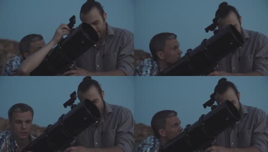 人们在黎明使用望远镜高清在线视频素材下载