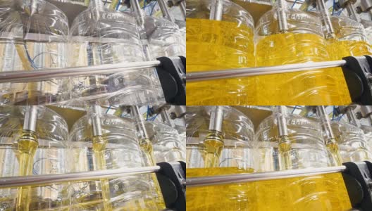 工厂设备倒葵花籽油的瓶子在生产线上移动。4 k。高清在线视频素材下载