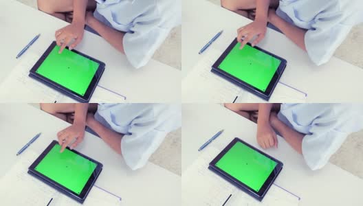 科学家在实验室使用带绿色屏幕的数字平板电脑高清在线视频素材下载