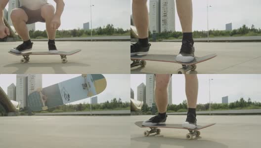 慢镜头特写:年轻的滑板运动员跳跃和在城市街道上做特技高清在线视频素材下载