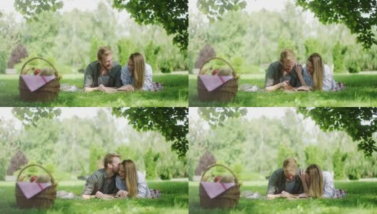 年轻夫妇花浪漫的时间在一起野餐在大自然高清在线视频素材下载