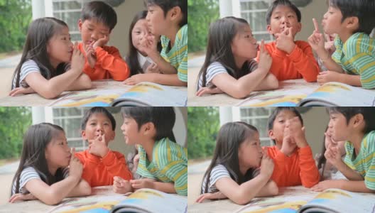 一群亚洲孩子一起读书高清在线视频素材下载