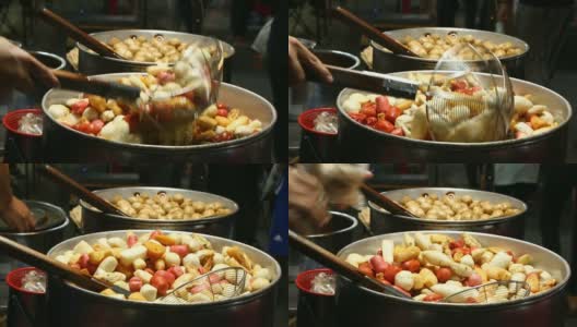 在平底锅里煎肉丸，泰国街头小吃高清在线视频素材下载