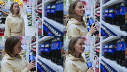 一位女士在超市的货架上买了一杯软饮料可乐高清在线视频素材下载