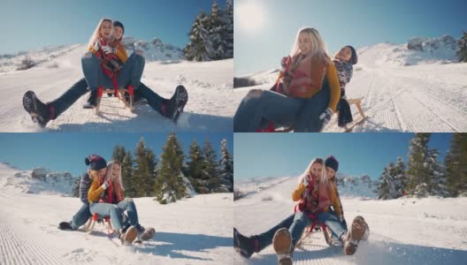 两个微笑的女朋友一起从雪山上滑下来，玩得很开心高清在线视频素材下载