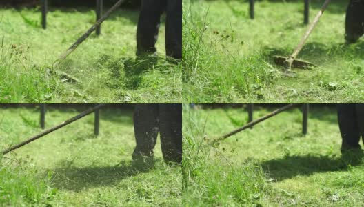 一个草修剪机修剪高草的慢动作特写镜头。高清在线视频素材下载