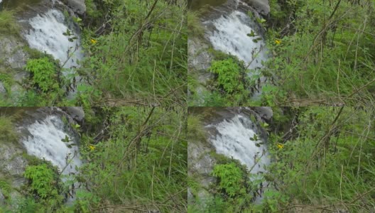 西林戈瀑布，西拉拉希村，北苏门答腊岛，印度尼西亚，瀑布的美丽与新鲜的绿色背景高清在线视频素材下载