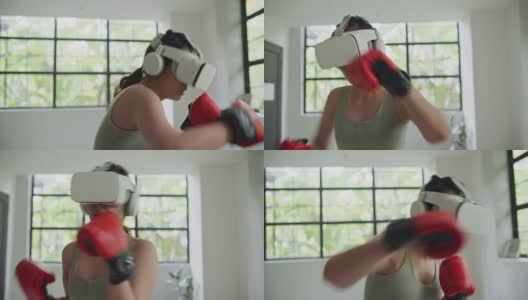 体育女子拳击在虚拟现实头盔训练踢在家里虚拟现实高清在线视频素材下载