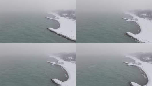 多伦多鸟瞰图，加拿大——冬天多伦多周围的海滩。可以看到它的周围是安大略湖。暴风雪越来越近了高清在线视频素材下载