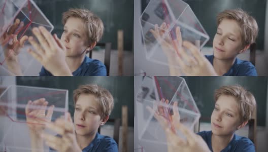 小男孩检验多面体的数学模型高清在线视频素材下载
