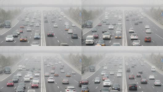 中国北京，2014年10月25日:在恶劣的天气下，人们在路上小心驾驶，中国北京高清在线视频素材下载