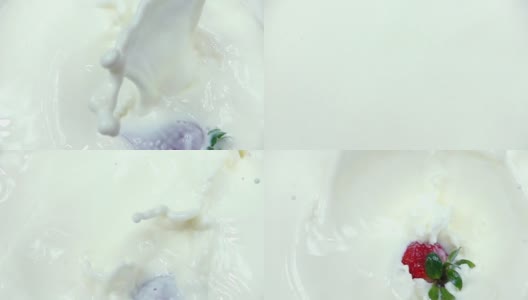 草莓落入奶油中的慢镜头高清在线视频素材下载