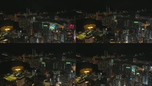 夜景照亮香港市区，海湾航拍4k高清在线视频素材下载