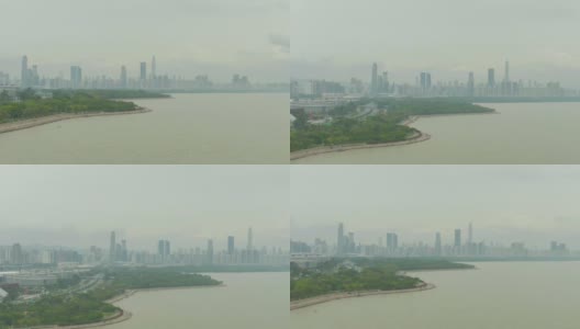 深圳湾与城市城市景观。中国中景镜头。鸟瞰图高清在线视频素材下载