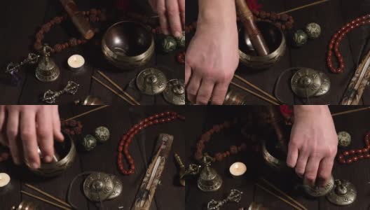 男性的手将祈祷和冥想的宗教物品摆放在桌上高清在线视频素材下载