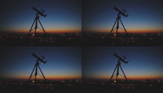 望远镜的轮廓和遥远的城市地平线。高清在线视频素材下载