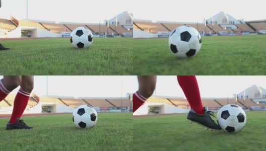 足球运动员用慢动作展示步法和足球运动员在球门上踢球和射门高清在线视频素材下载