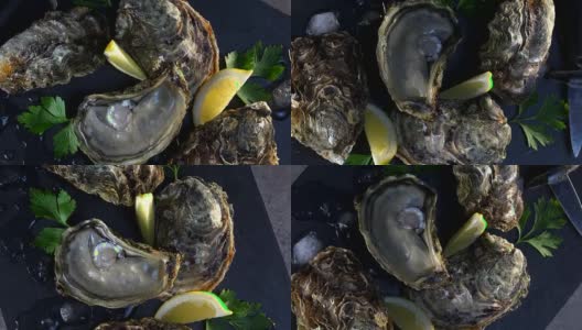 牡蛎和柠檬在灰色背景海鲜，转盘高清在线视频素材下载