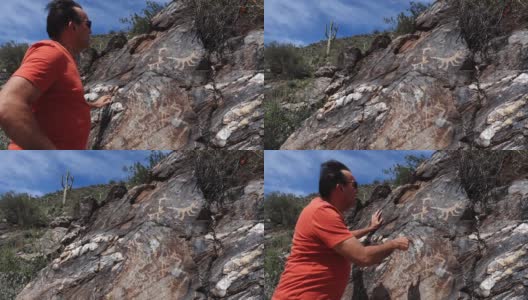 一男子在亚利桑那沙漠发现了印度象形文字高清在线视频素材下载