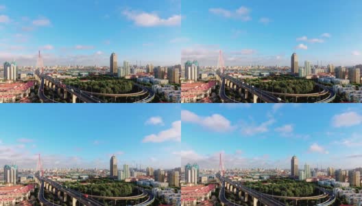 阳光明媚的上海杨浦大桥和城市景观全景，延时视频，4k镜头，云和汽车快速移动，美丽的风景。高清在线视频素材下载