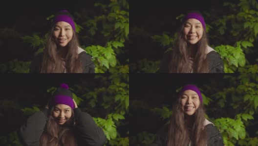 肖像漂亮的亚洲女人徒步旅行者在泡泡帽高清在线视频素材下载