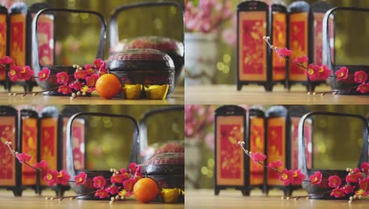 中国古代篮子与人造花和春节装饰金元宝高清在线视频素材下载