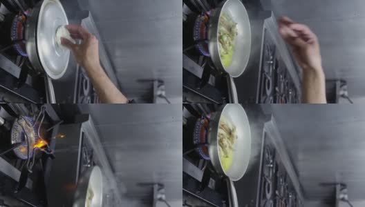 厨师在平底锅里用大蒜烹饪蛤蜊，并在上面撒上香草。垂直视频。特写镜头。高清在线视频素材下载