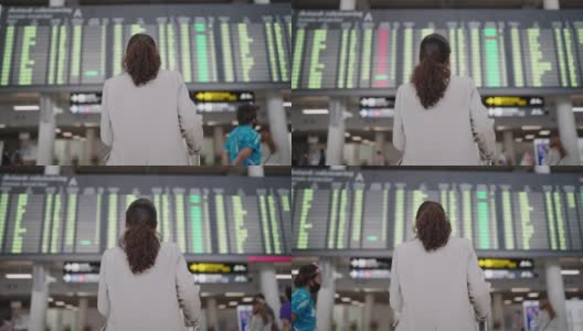 亚洲女商人看着机场登机牌高清在线视频素材下载