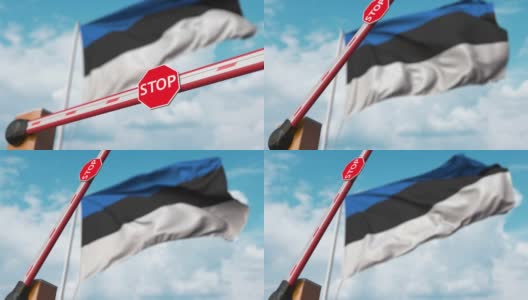 在爱沙尼亚国旗前打开了有停止标志的路障高清在线视频素材下载