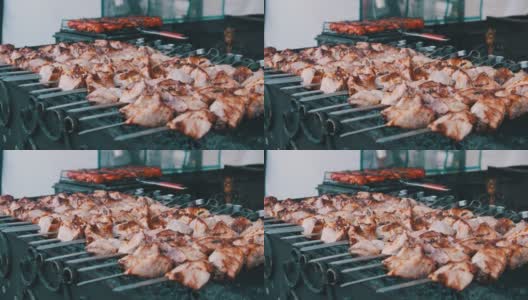 烤肉串是在街头食品市场烧烤的。街的厨房高清在线视频素材下载