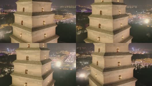 陕西西安大雁塔景区夜间鸟瞰图及城市天际线高清在线视频素材下载