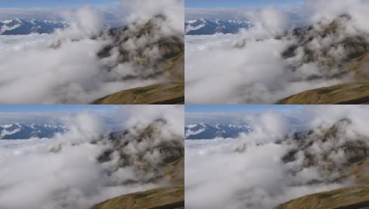 从古里山口拍摄的梅厄山。山看起来比云还高。上斯瓦内提，乌斯巴关口附近的梅斯蒂亚。格鲁吉亚欧洲。高清视频高清。高清在线视频素材下载