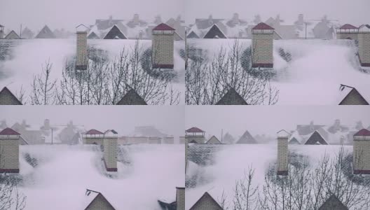 超级慢镜头拍摄冬季住宅倾斜屋顶上的暴风雪高清在线视频素材下载