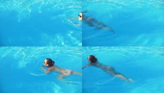 在阳光明媚的夏日里，年轻的黑发女子穿着比基尼和太阳镜在游泳池里游泳高清在线视频素材下载