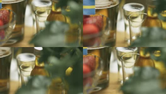 传统仲夏晚宴上的瑞典杜松子酒高清在线视频素材下载