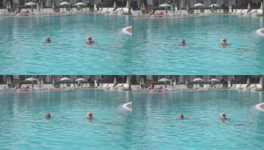 老年夫妇在游泳池慢动作250帧/秒高清在线视频素材下载