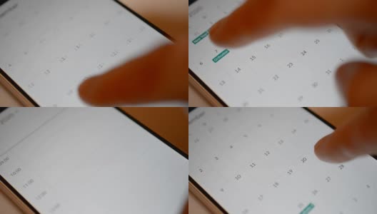 男子在移动设备上使用日历应用程序，白色背景上的特写高清在线视频素材下载