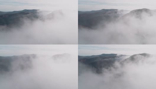 秋天的鸟瞰图。自然和Cloudscape。雾和雾周围创造了简单的景观。高清在线视频素材下载