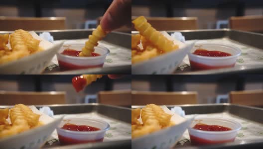慢镜头捡起薯条薯条蘸番茄酱番茄酱高清在线视频素材下载