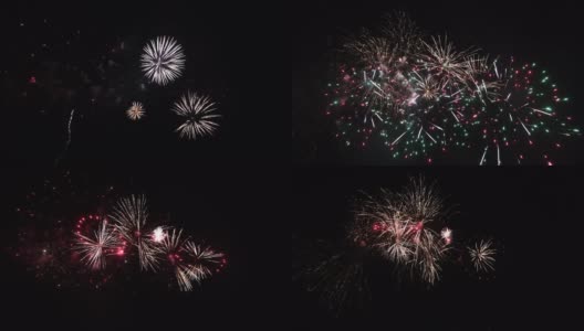 长时间无缝循环的真实抽象彩色烟花节日表演在黑色背景天空国庆假期期间，新年晚会2022高清在线视频素材下载