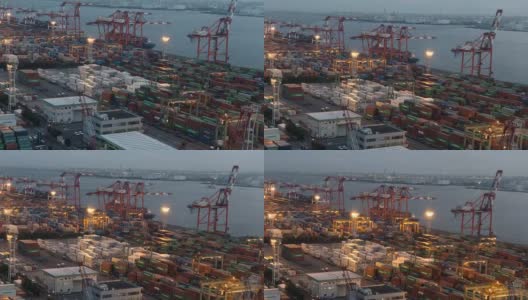 白天到夜晚延时:鸟瞰图的港口工作的货物集装箱在台场日本东京高清在线视频素材下载