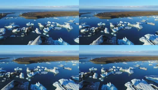 4K空中电影飞越冰川碎片泻湖，冰岛Jokulsarlon高清在线视频素材下载