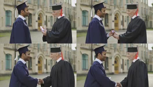 著名教授在毕业典礼上给男生握手高清在线视频素材下载