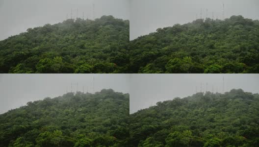 雨点运动与云风暴在山上高清在线视频素材下载