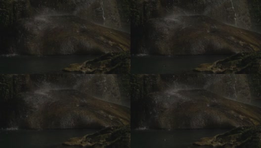 瀑布溅在岩石上，慢镜头高清在线视频素材下载
